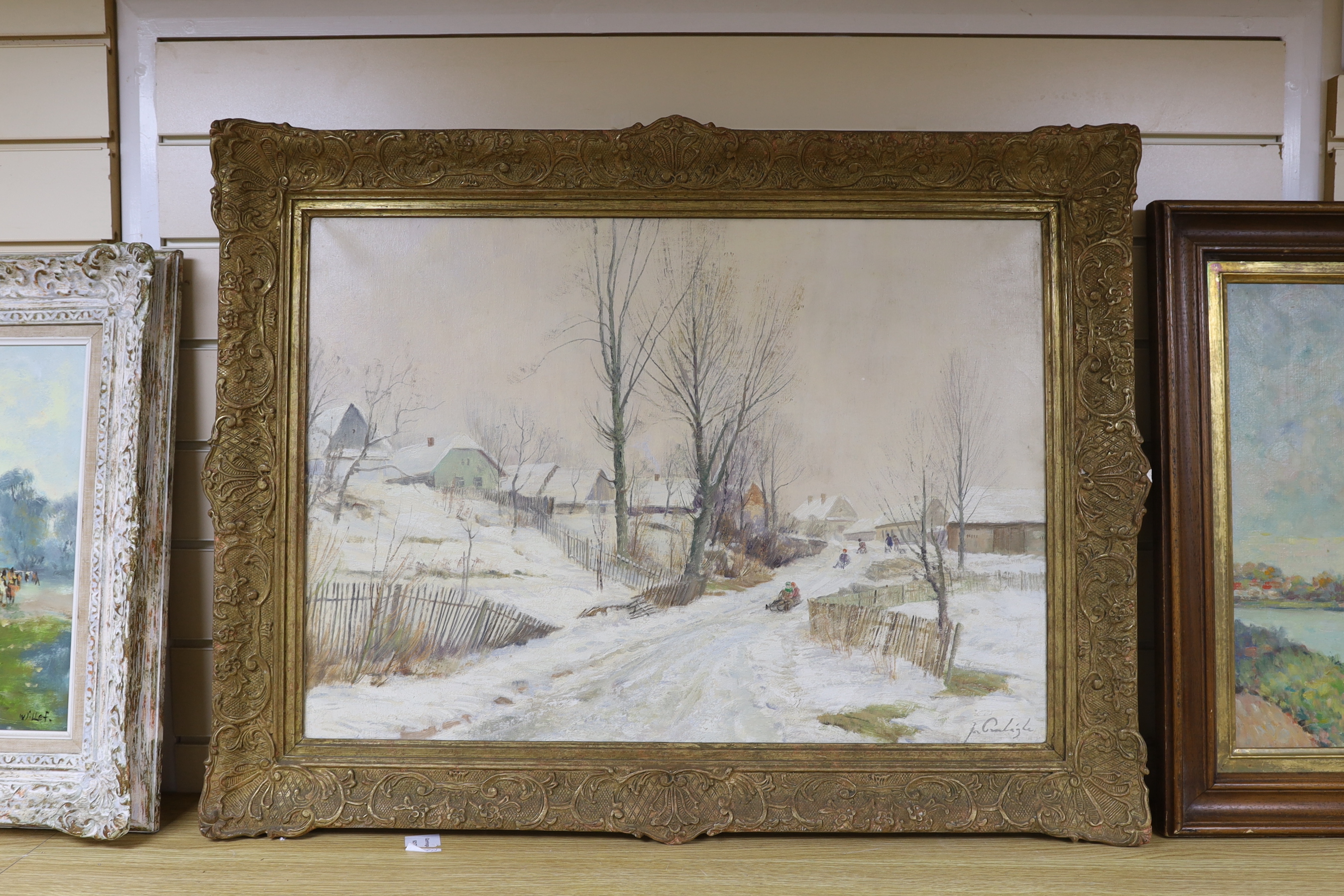 French School, oil on canvas, Children sledging in a winter landscape, indistinctly signed, 50 x 70cm